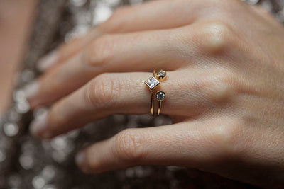 3-Stone Princess-Cut White Diamond Engagement Ring with 2 Side Round White Diamonds