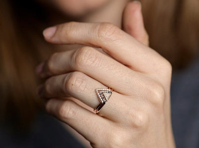 Triangle Cut Modern White Diamond Engagement Halo Ring with Black and White Diamonds Surrounding the main gemstone