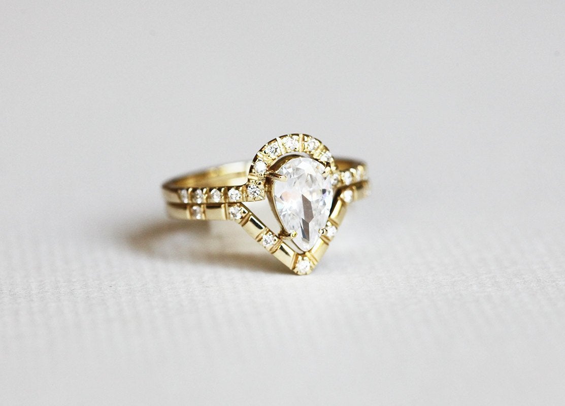 Pear White Diamond Halo Wedding Ring with Side White Diamonds