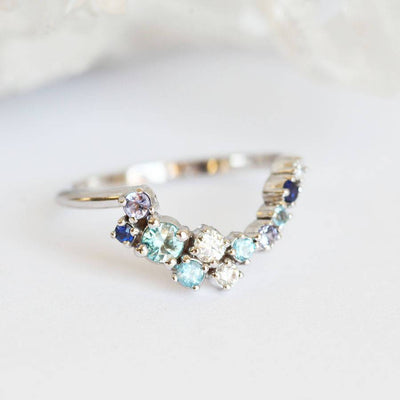 Round blue sapphire, diamond, aquamarine and topaz nested ring