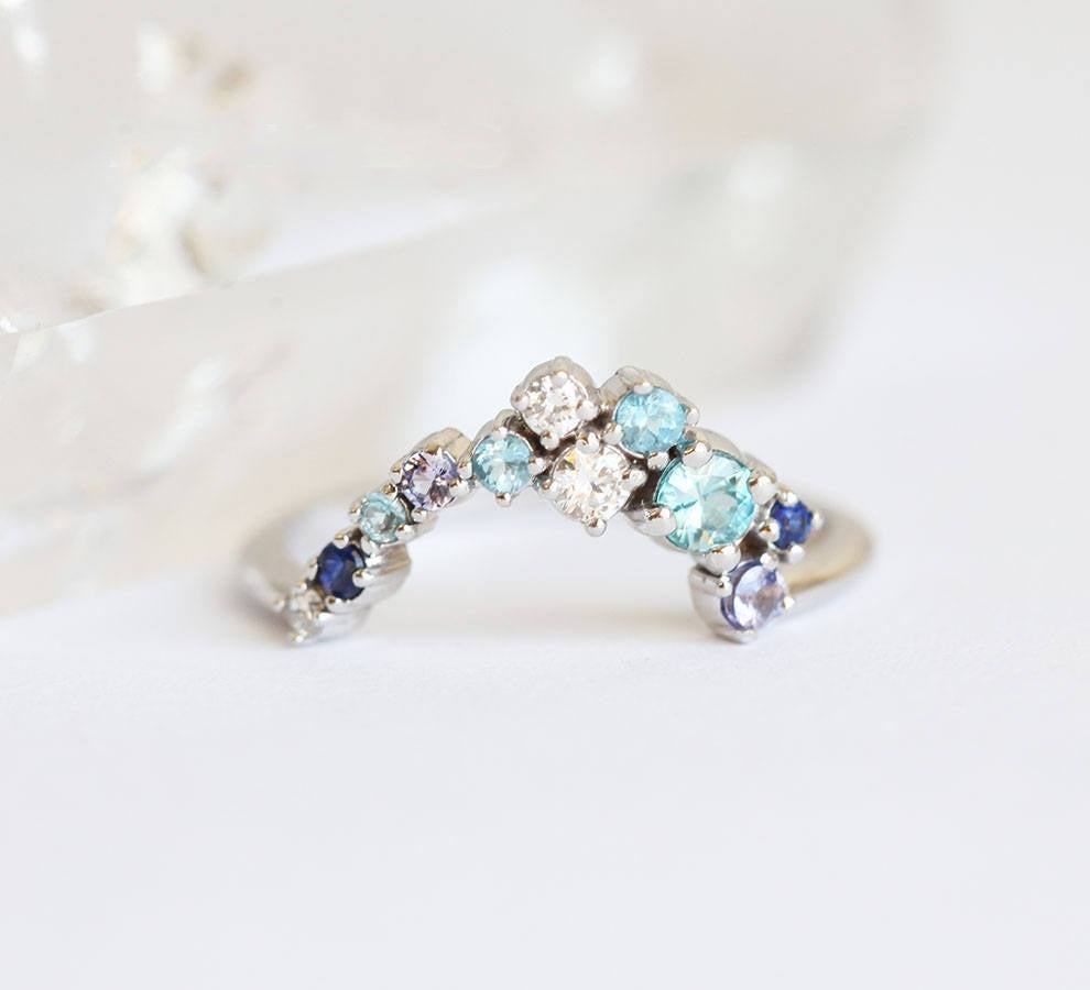 Round blue sapphire, diamond, aquamarine and topaz nested ring