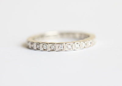 Round White Diamond Eternity Wedding Band with square texture