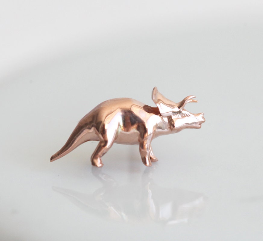 Triceratops and tyrannosaurus rex gold stud earrings