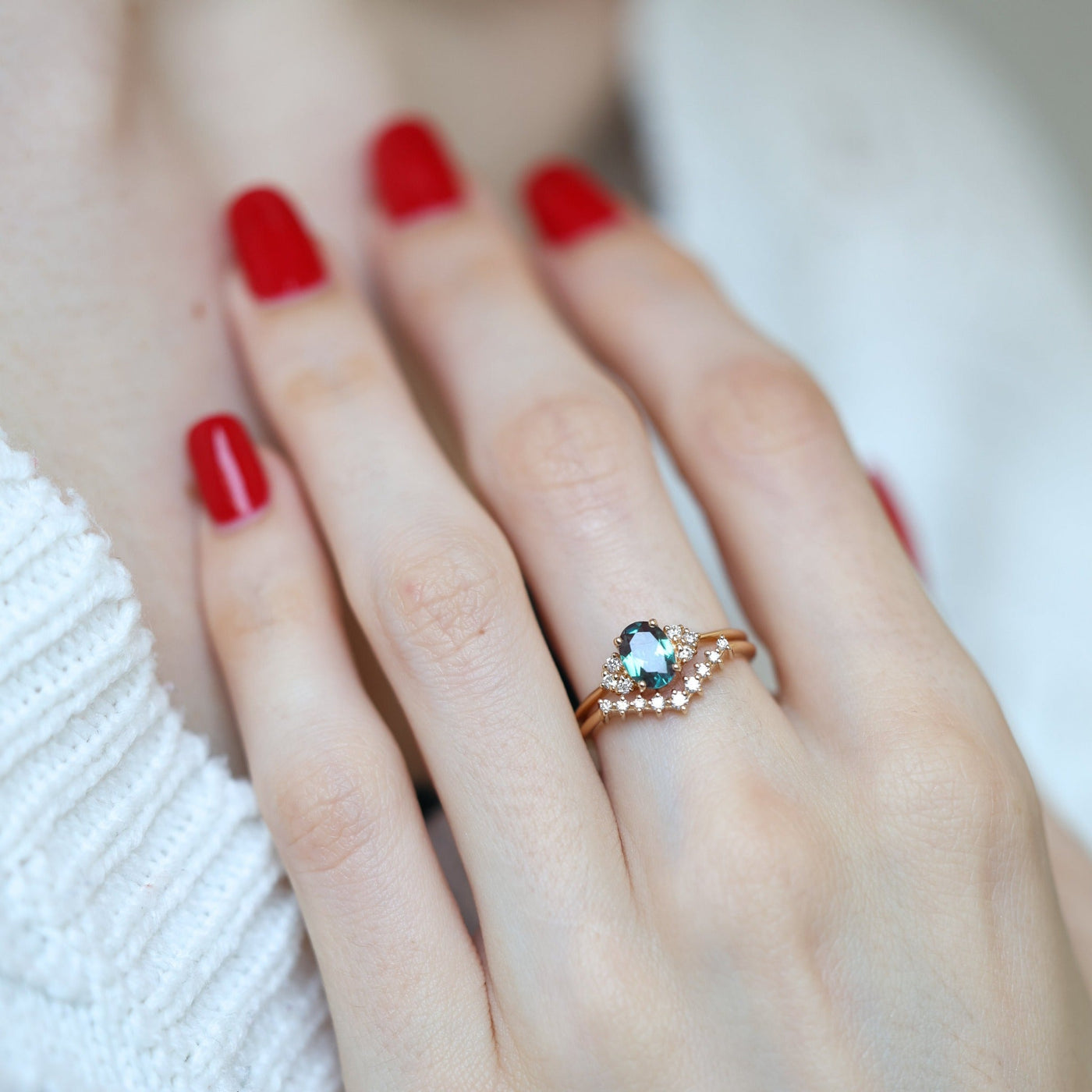 Teal Oval Alexandrite Ring Set with Nesting Band holding White Diamonds