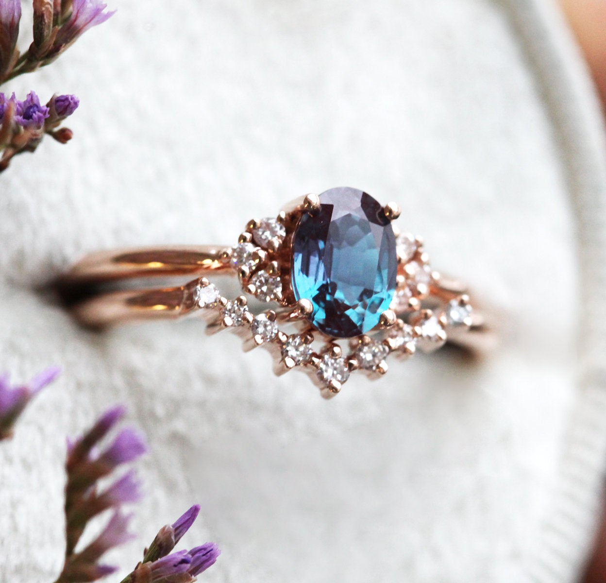 Teal Oval Alexandrite Ring Set with Nesting Band holding White Diamonds