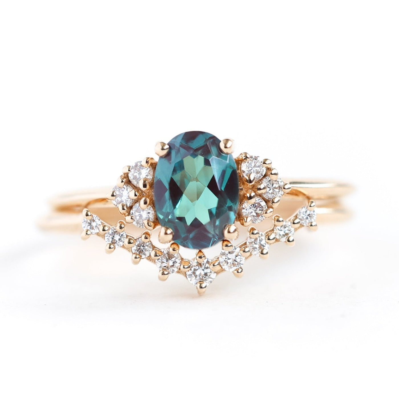 Teal Oval Alexandrite Ring Set with Nesting Band holding White Diamonds