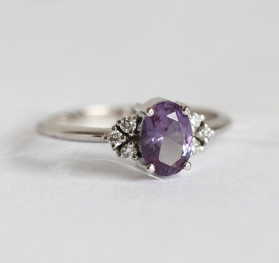 Purple Oval Alexandrite Ring with 6 Side Round White Diamonds