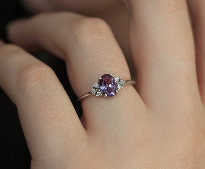 Purple Oval Alexandrite Ring with 6 Side Round White Diamonds