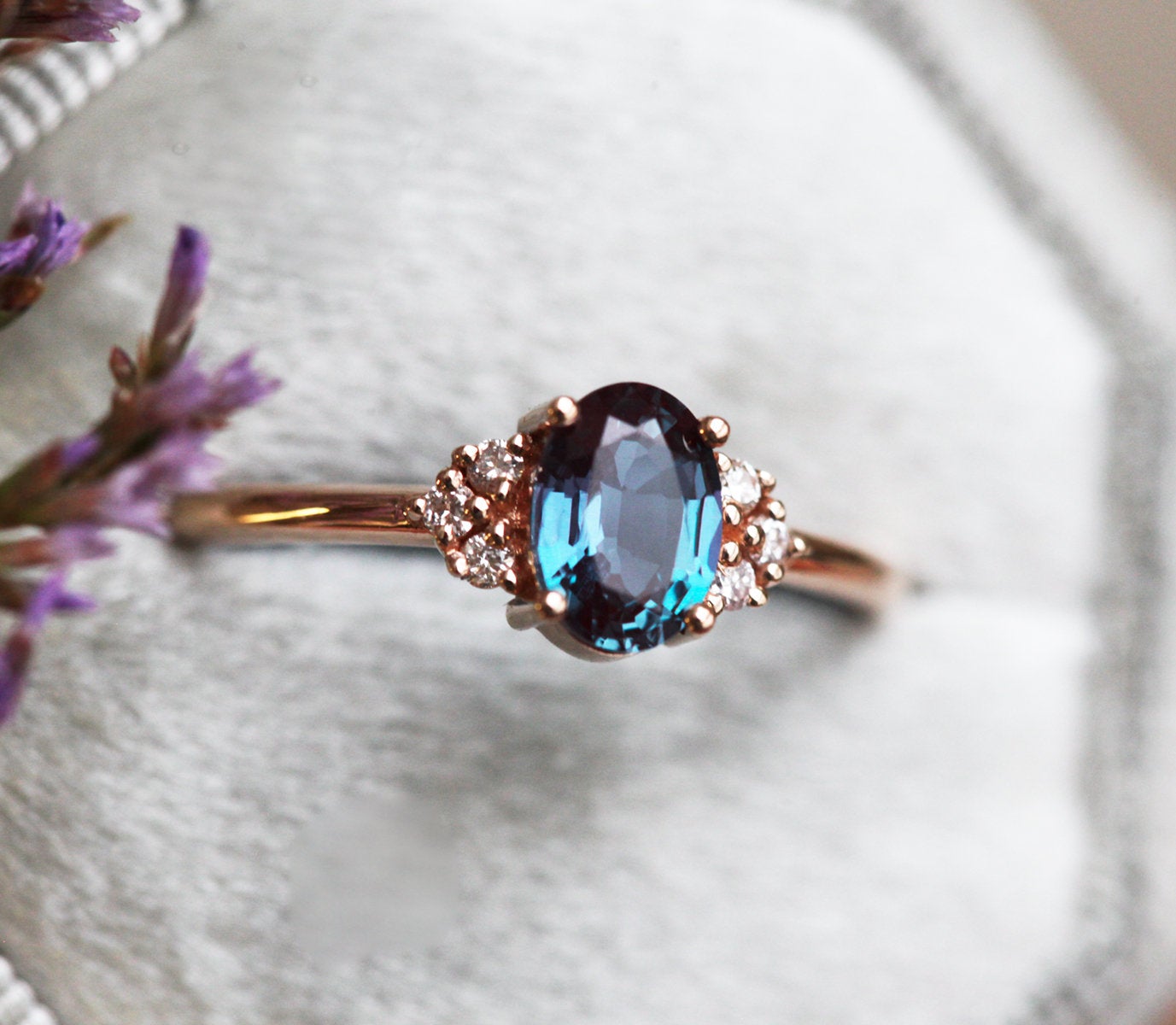 Teal Oval Alexandrite Ring with 6 Side Round White Diamonds