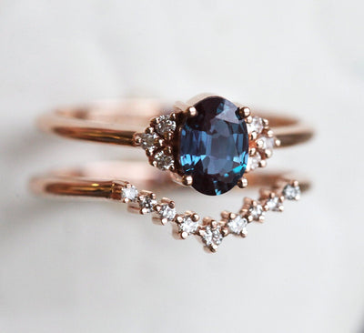 Teal Oval Alexandrite Ring with 6 Side Round White Diamonds with V-Shaped Diamond Band