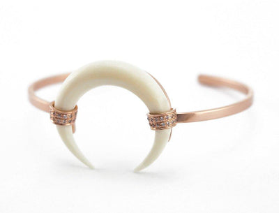 Rose gold double horn bracelet with white round diamonds