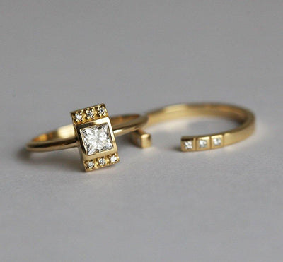 Princess Cut White Diamond Ring with Side White Diamonds and complementary Square-Cut Diamond Ring