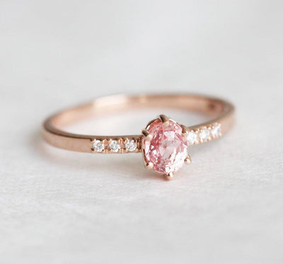 Oval peach sapphire ring with diamond pave