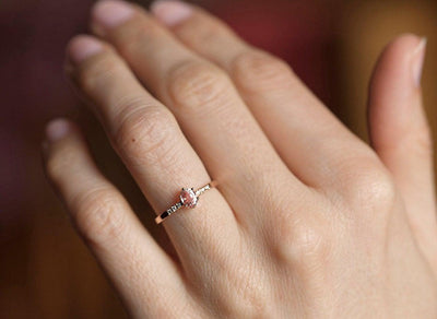 Oval peach sapphire ring with diamond pave