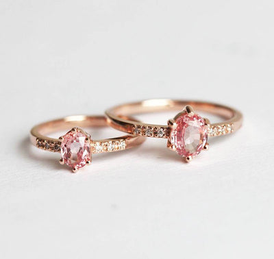 Oval peach sapphire ring with diamond pave