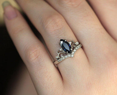Vintage blue marquise-cut sapphire with side diamonds
