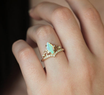 Marquise-Cut Opal Vintage Ring with Carefully Arrayed Round White Diamonds