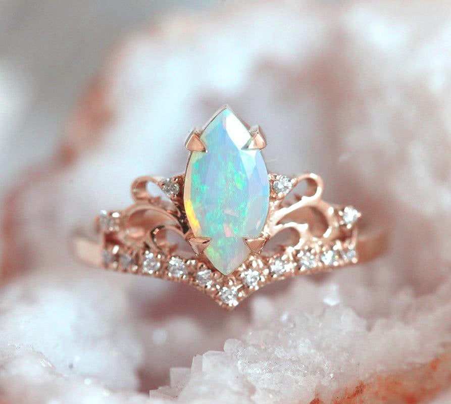 Marquise-Cut Opal Vintage Ring with Carefully Arrayed Round White Diamonds