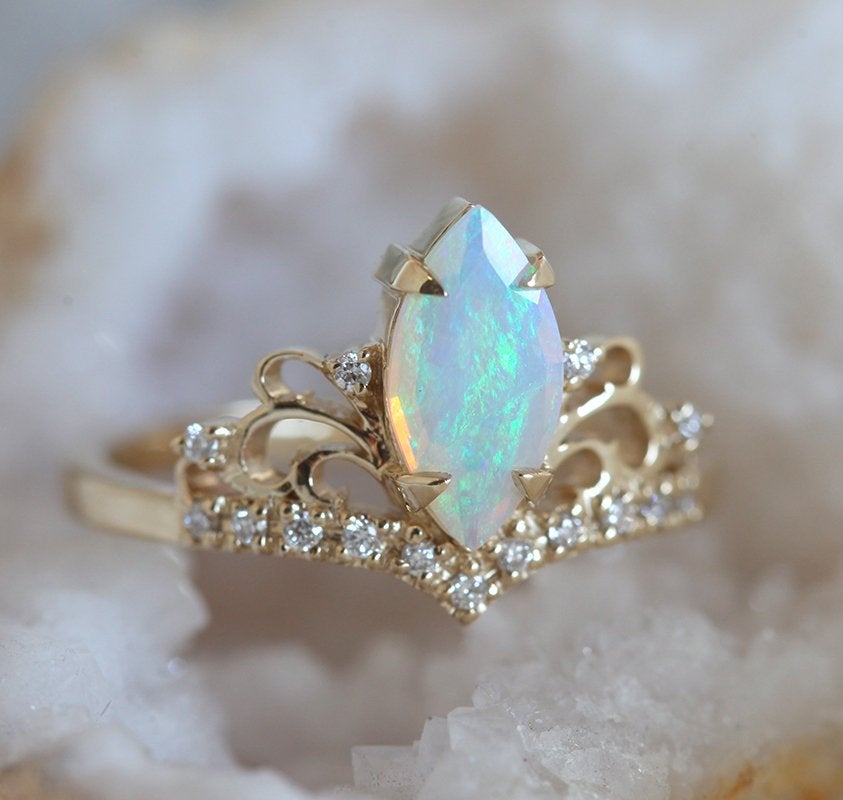 Marquise-Cut Opal Vintage Ring with Carefully Arrayed Round White Diamonds