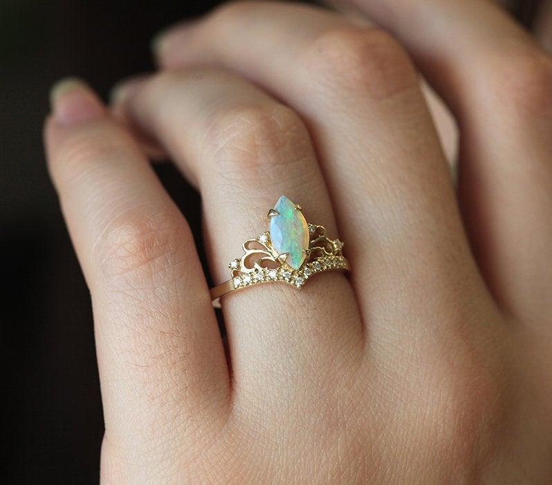 Marquise-Cut Opal Vintage Ring with Carefully Arrayed Round White Diamonds