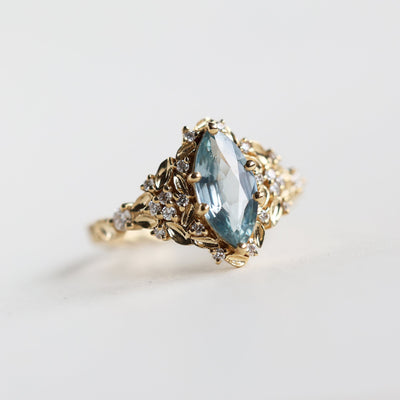 Elara marquise aqua sapphire ring with leaf detail and diamonds