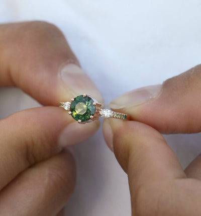 Round green sapphire ring with diamond, garnet, tourmaline and demantoid side stones