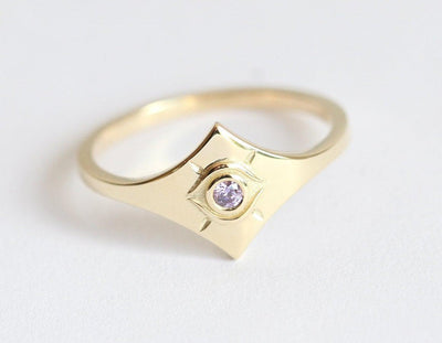 Purple Round Tanzanite Evil Eye Looking Yellow Gold Ring