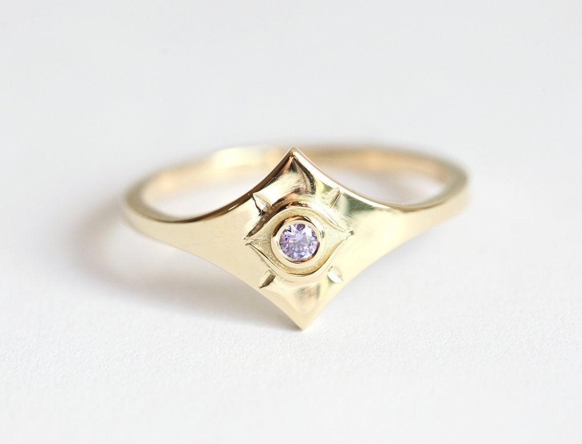 Purple Round Tanzanite Evil Eye Looking Yellow Gold Ring