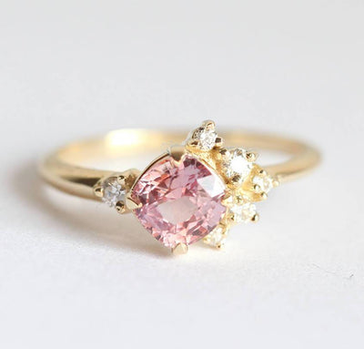 Cushion-cut pink sapphire cluster ring with diamonds