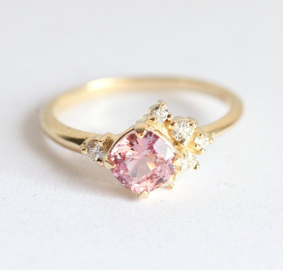Cushion-cut pink sapphire cluster ring with diamonds