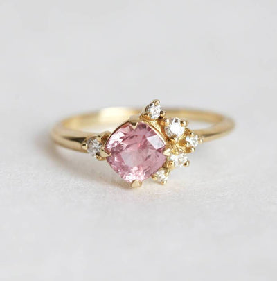 Cushion-cut pink sapphire cluster ring with diamonds