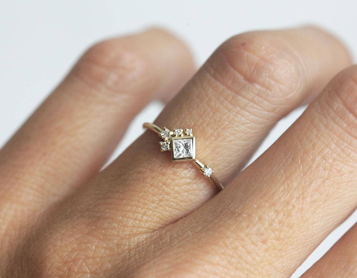 Princess Cut White Diamond Cluster Ring with Round White Side Diamonds