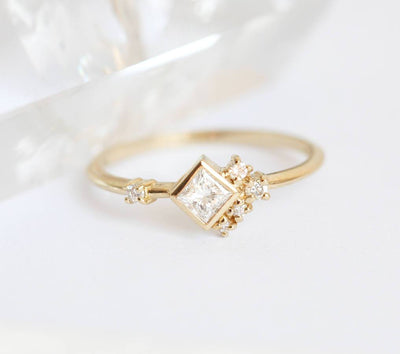 Princess Cut White Diamond Cluster Ring with Round White Side Diamonds