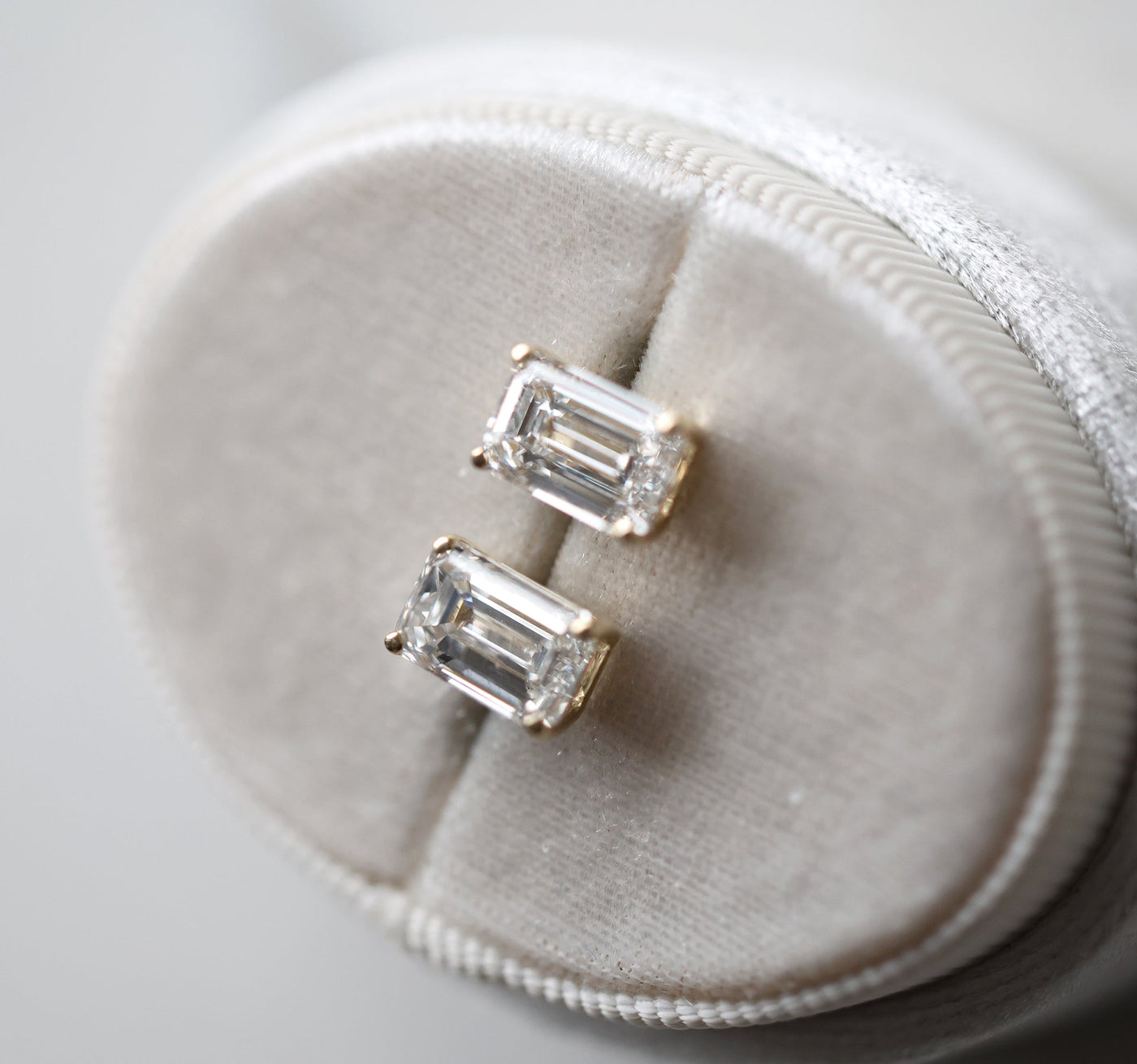 Emerald cut diamond stud earrings