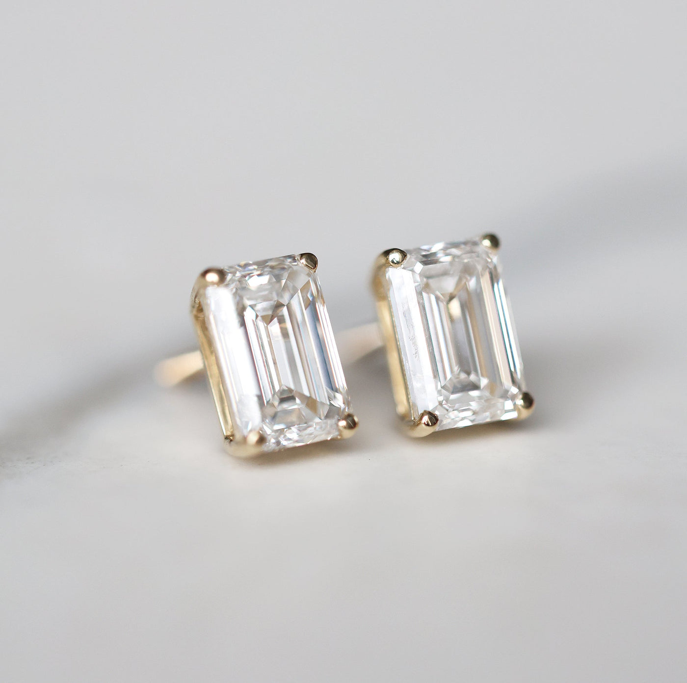 Emerald cut diamond stud earrings