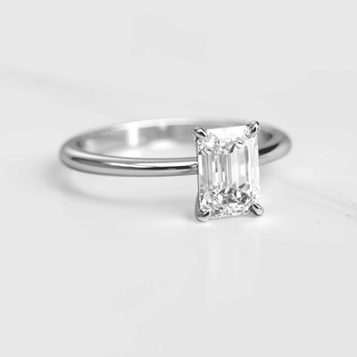 Emerald-Cut Tapered White Diamond Solitaire Ring