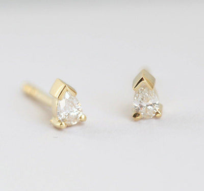 Pear-cut white diamond stud earrings