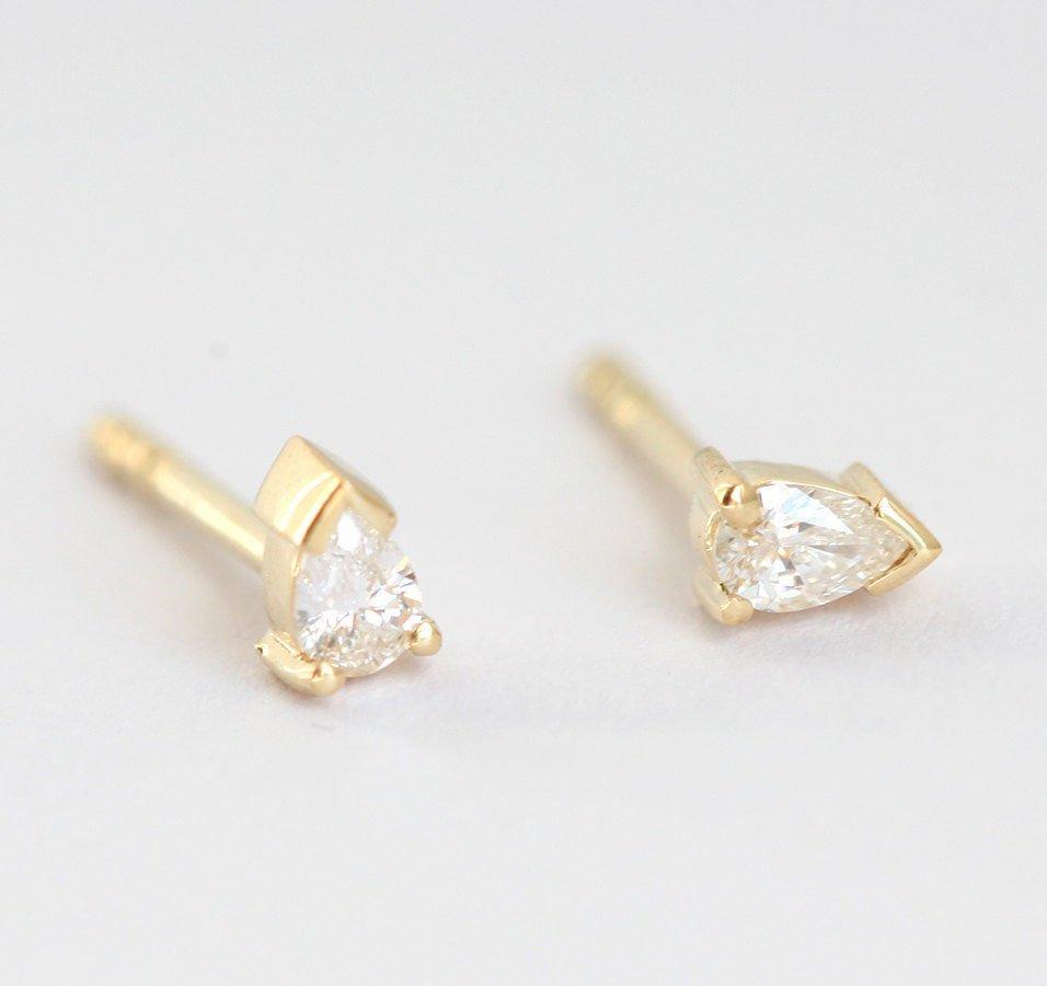 Pear-cut white diamond stud earrings