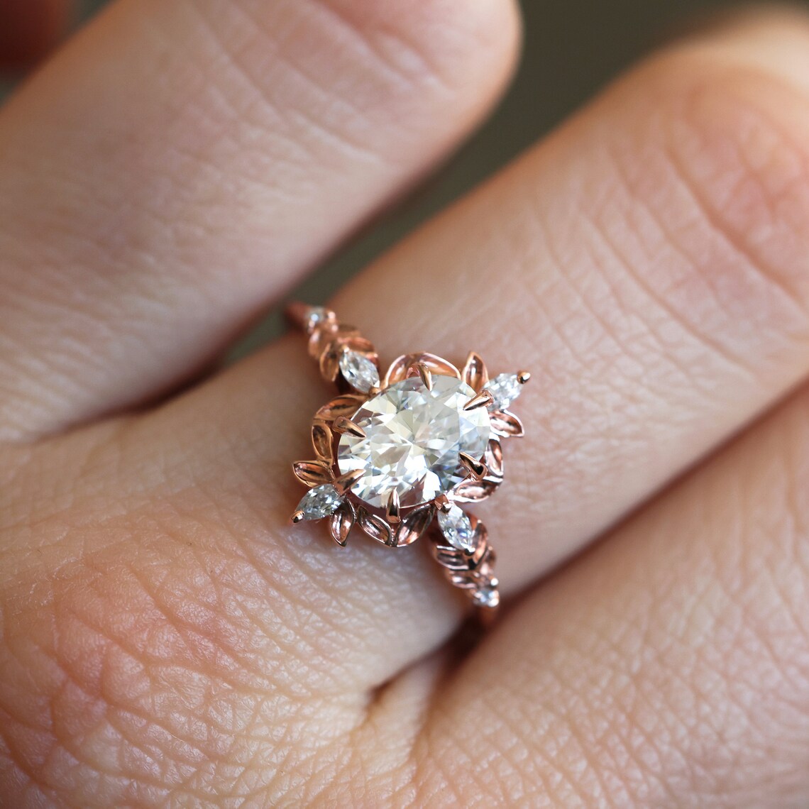 Oval Diamond Engagement Ring, a stunning piece with lab-grown or natural diamond, marquise white Diamonds, and intricate design.