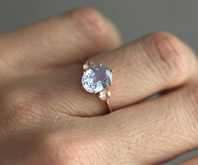 Oval sapphire ring with white side diamonds