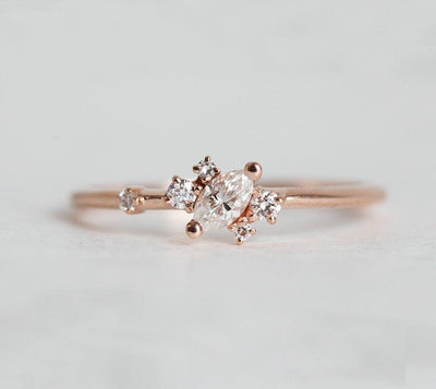 Marquise-Cut White Diamond Ring with Asymmetric Array of Side Diamonds