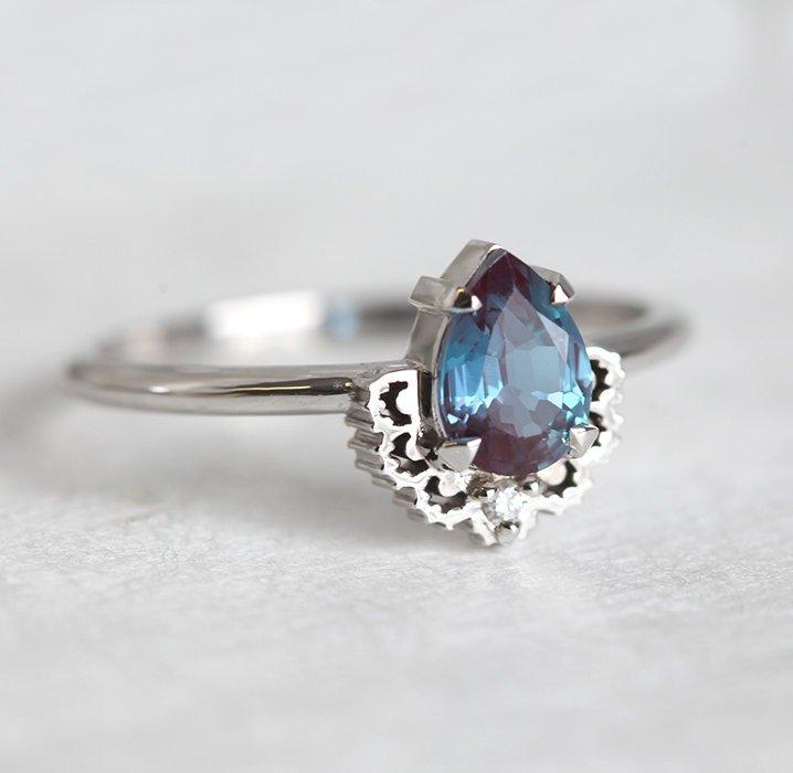 Teal Pear Alexandrite Ring with One Side Round White Diamond