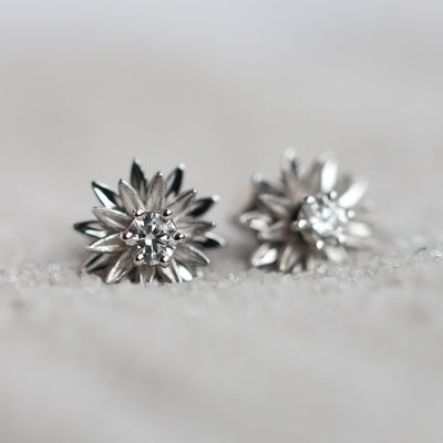 Floral round white diamond stud earrings