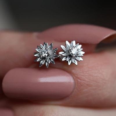 Floral round white diamond stud earrings