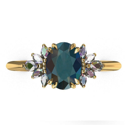 Oval teal sapphire ring with white side diamonds