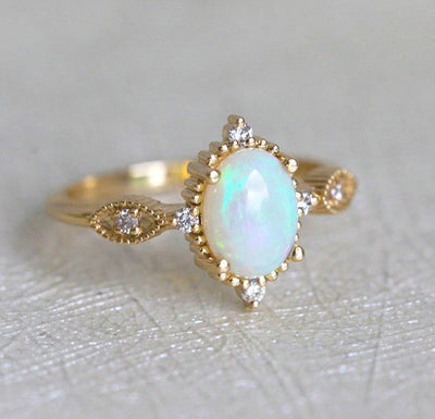 Unique Shape Vintage Oval Opal Ring with Side Round White Diamonds