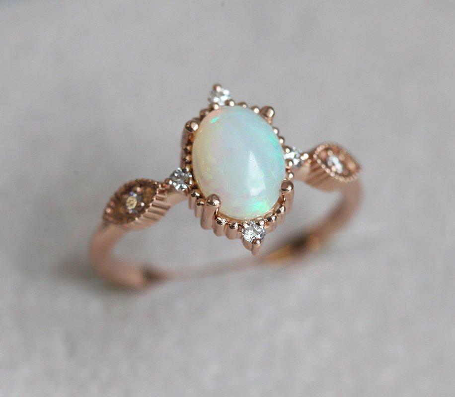 Unique Shape Vintage Oval Opal Ring with Side Round White Diamonds