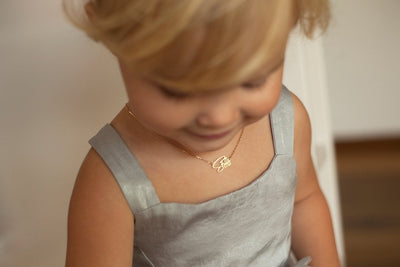 Child's gold chain with personalized name