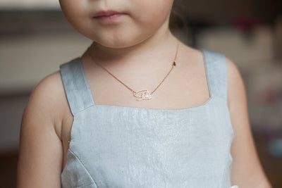 Child's gold chain with personalized name