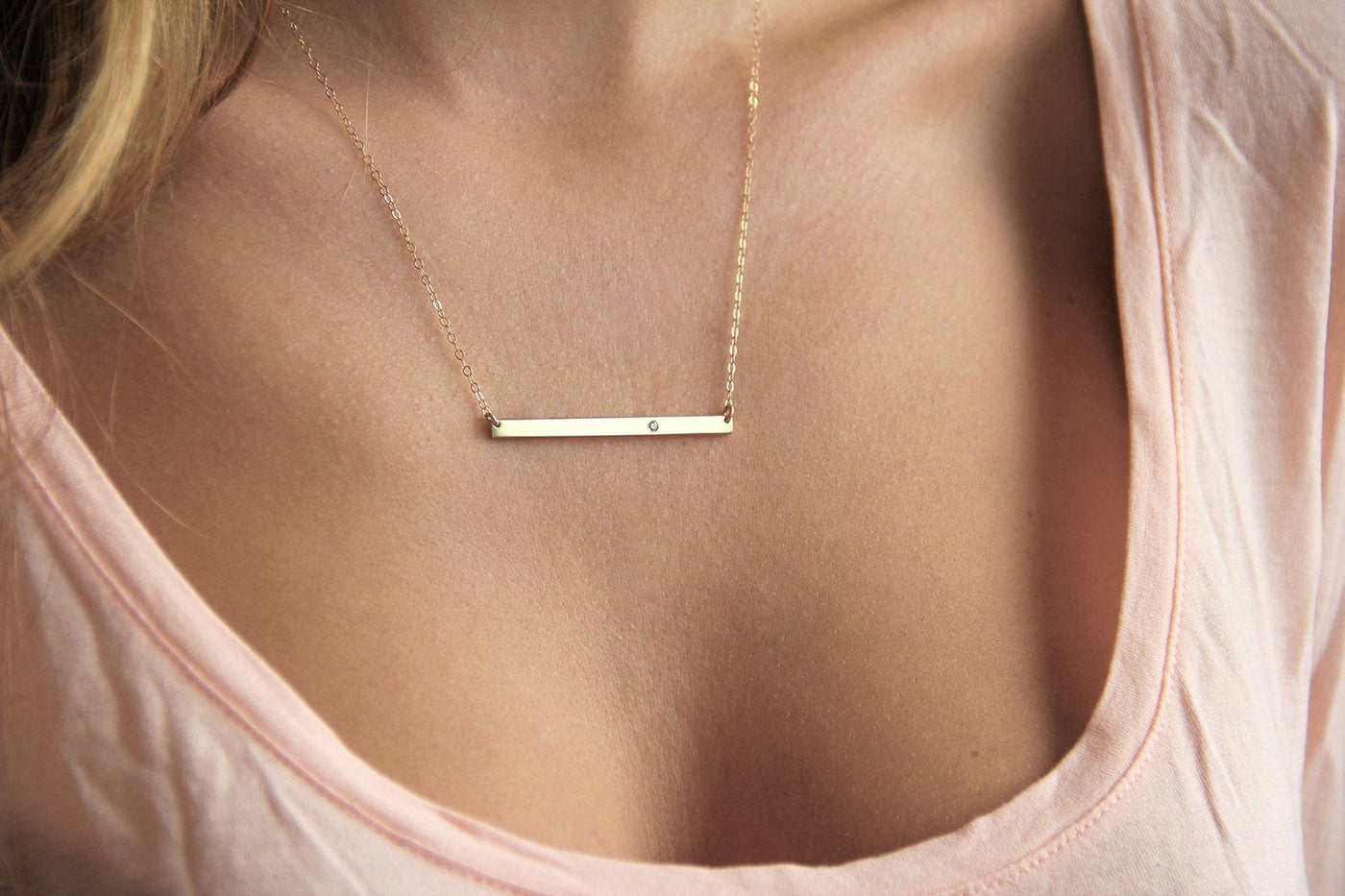 Thin Gold Bar Necklace with Round White Diamond embedded into the bar